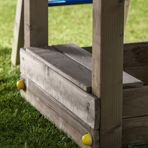 Climbing frame Rumble Ridge Rock Wall featuring single swing and slide