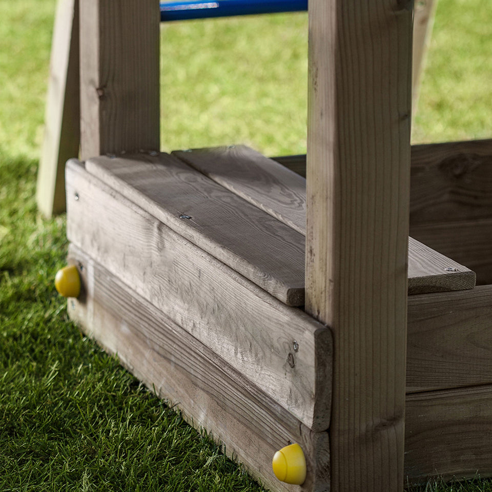 Climbing frame Rumble Ridge Rock Wall featuring single swing and slide